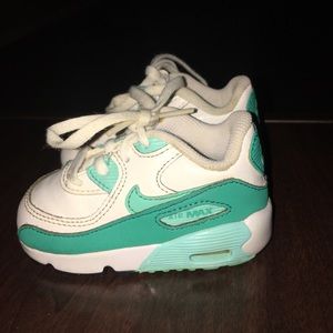 Kids white and turquoise Nike’s